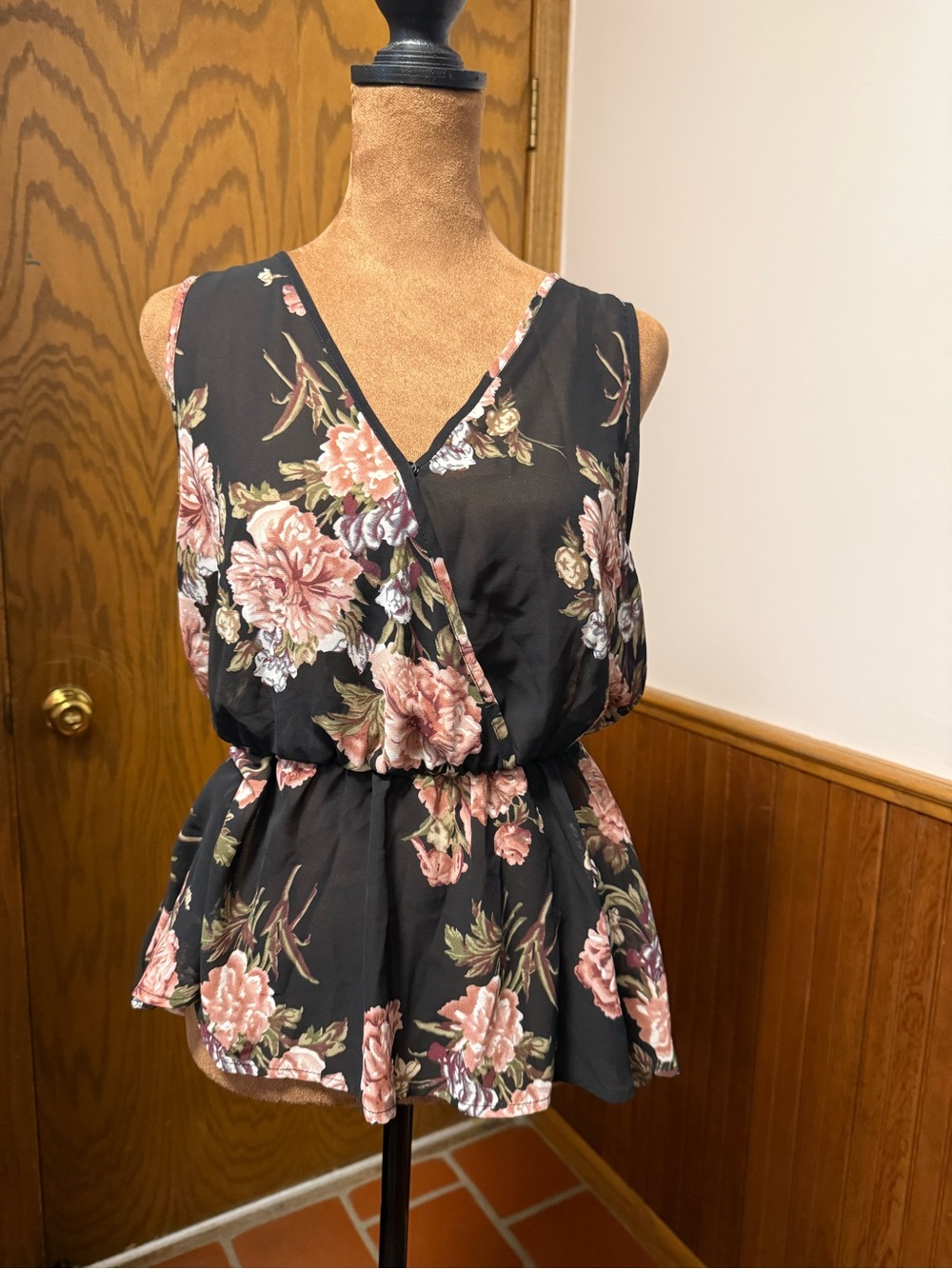Sleeveless V-Neck Peplum Blouse in Black with Blush Floral